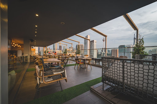 How to Build a Rooftop Deck on a Sloped Roof?